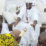 Adeleke prostrates for Ooni of Ife